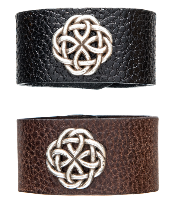 Brown and black leather cuff with Celtic knot. 